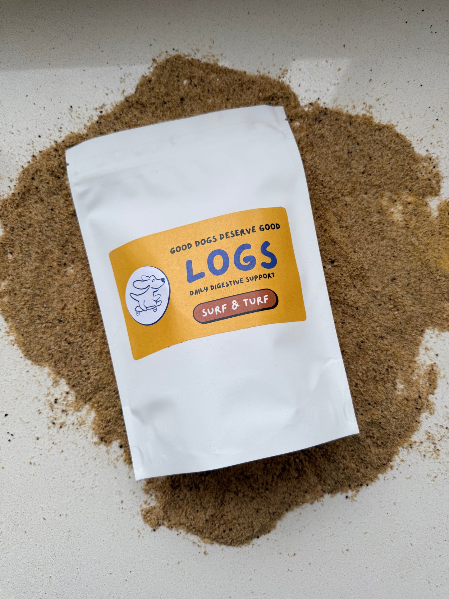 White packaging with a label on a sandy background
